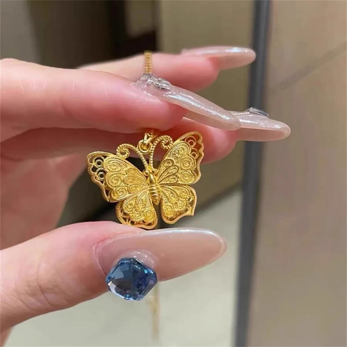 Gold Butterfly Pendant